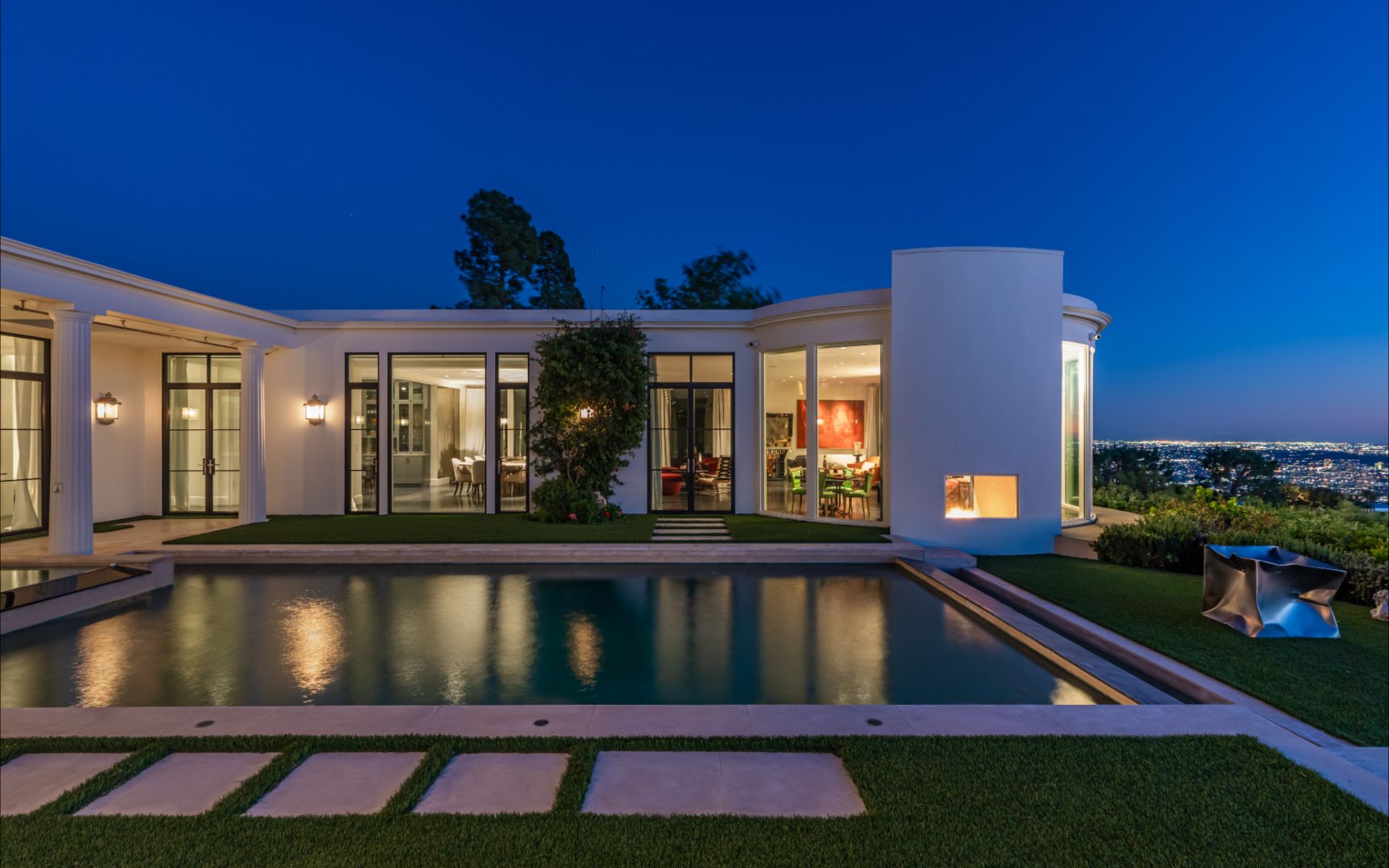 Courtyard and outdoor fireplace at night