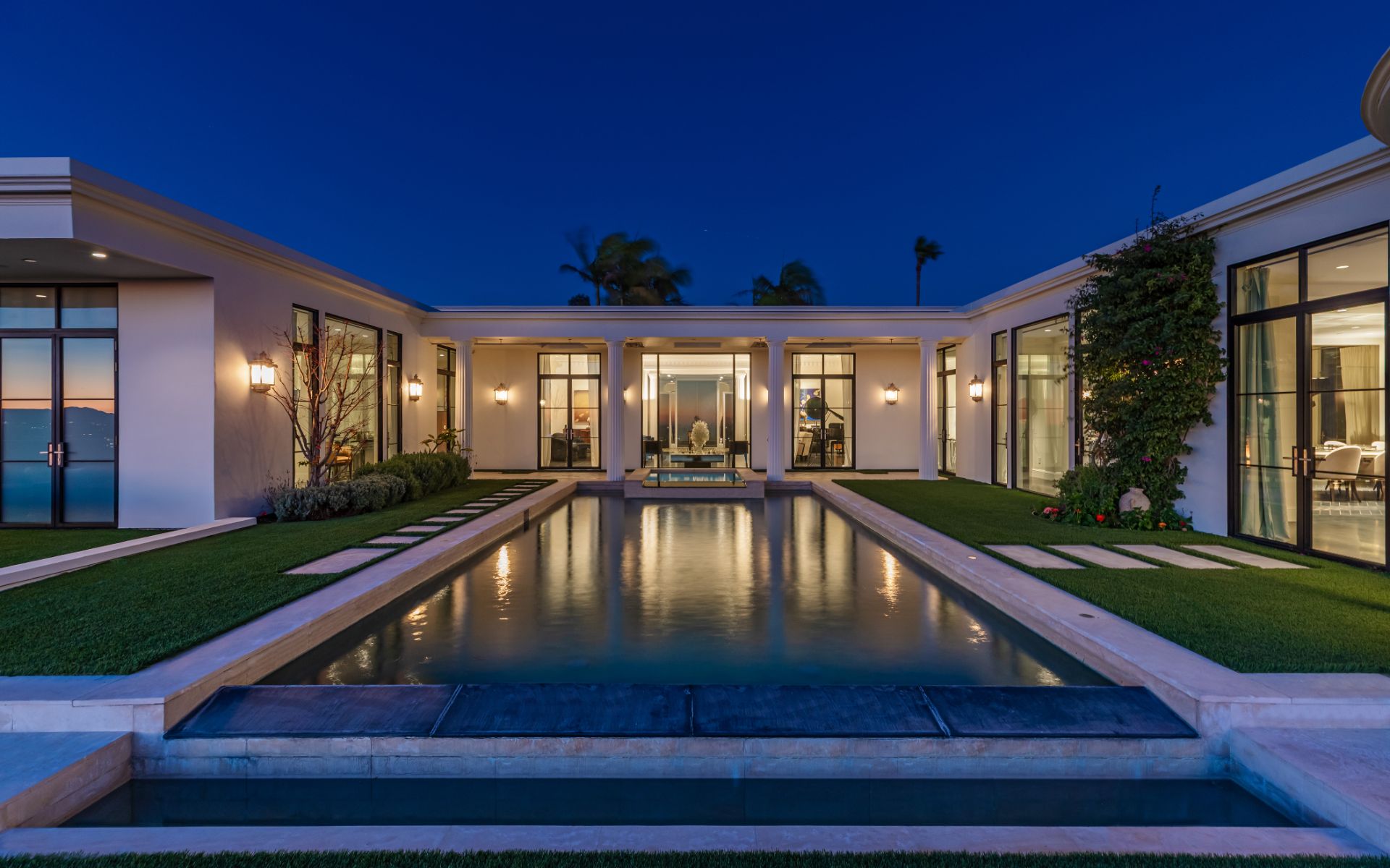 Courtyard pool between the wings at night