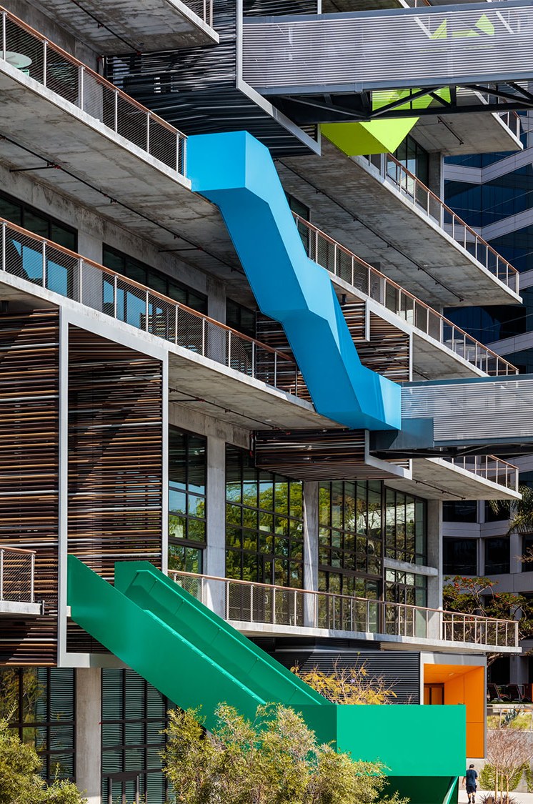 Blue exterior stair between balconies