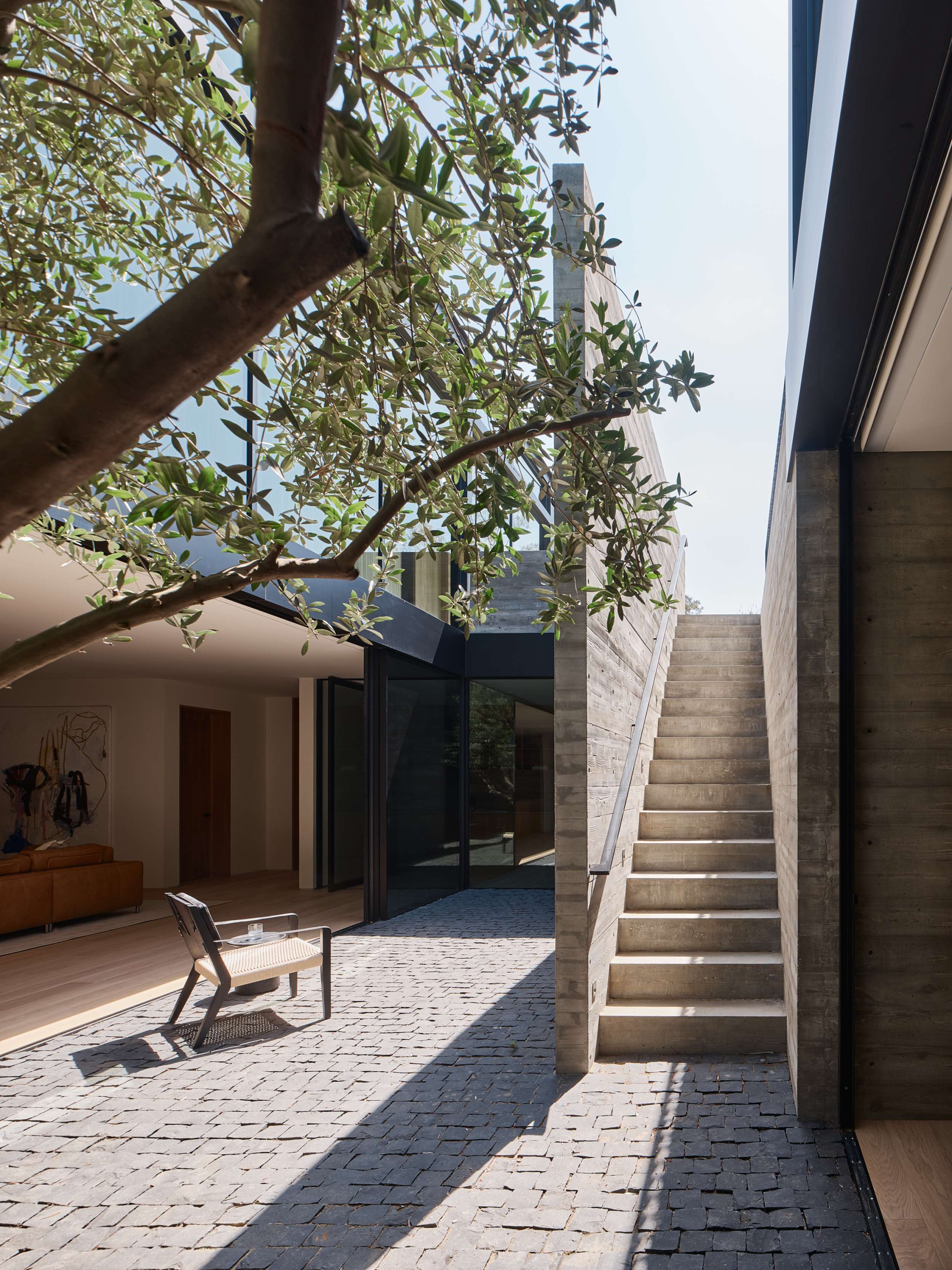Courtyard stair in board-formed concrete