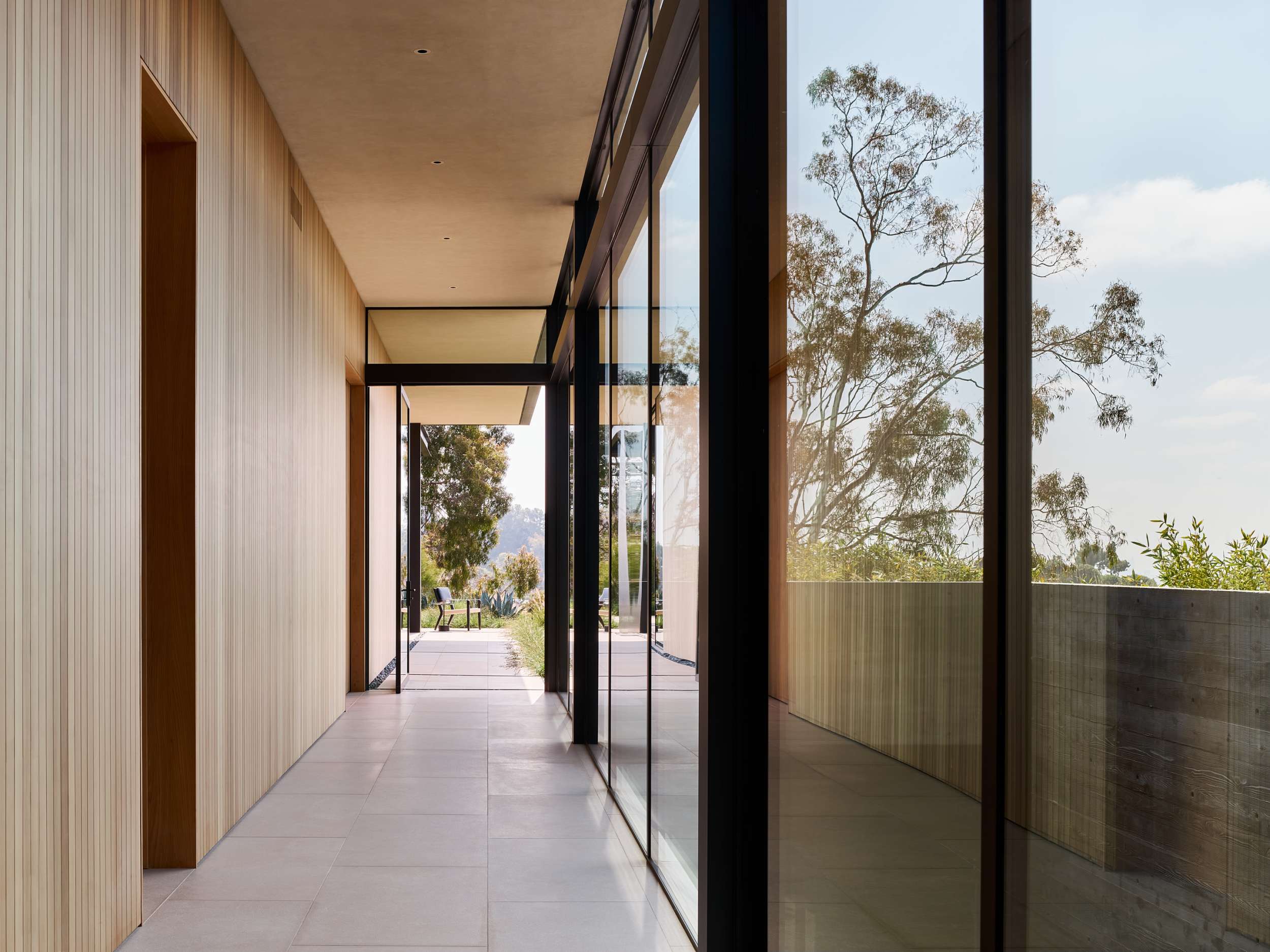 Gallery corridor in oak and glass
