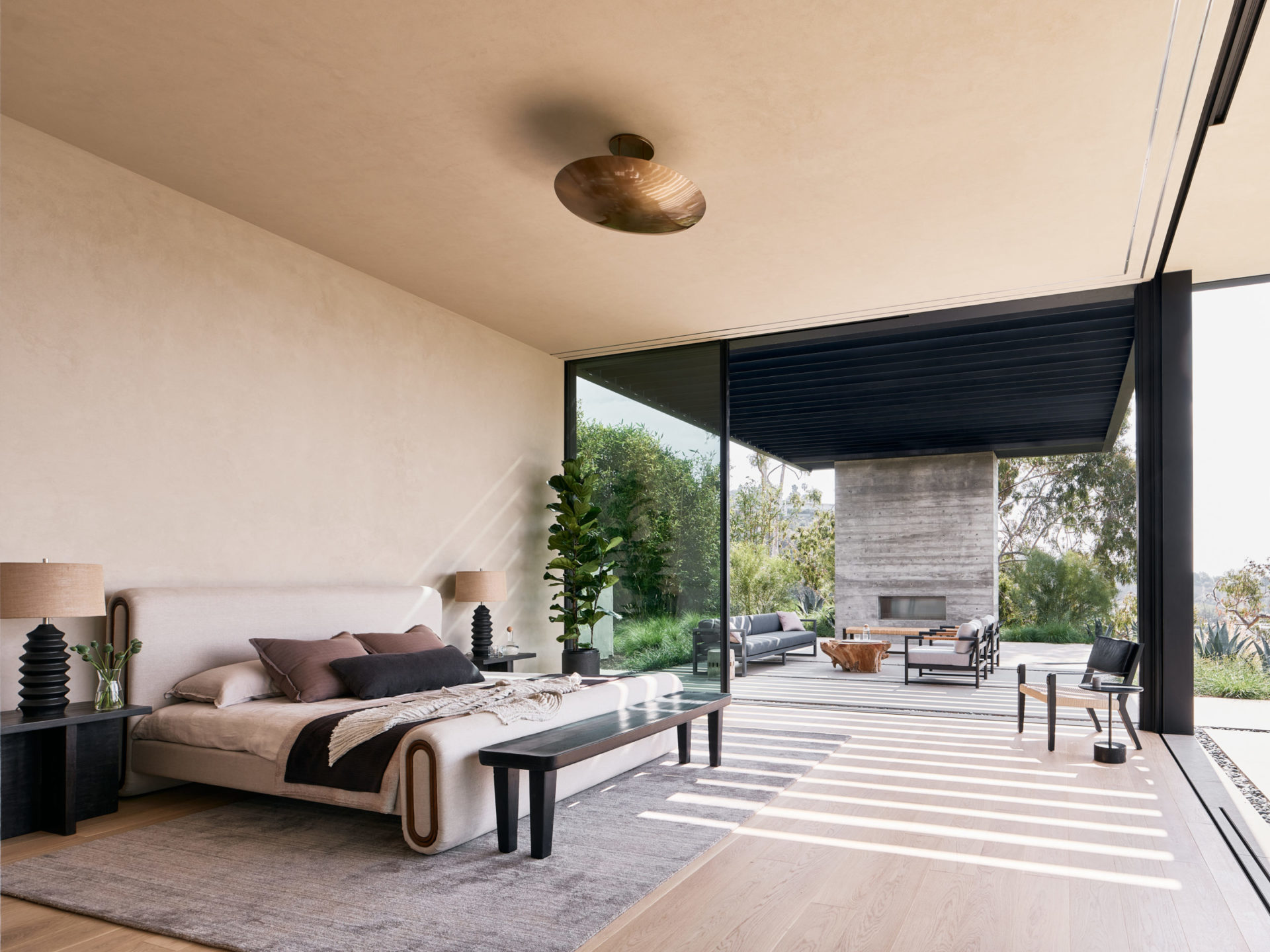 Primary suite opening to the terrace fireplace