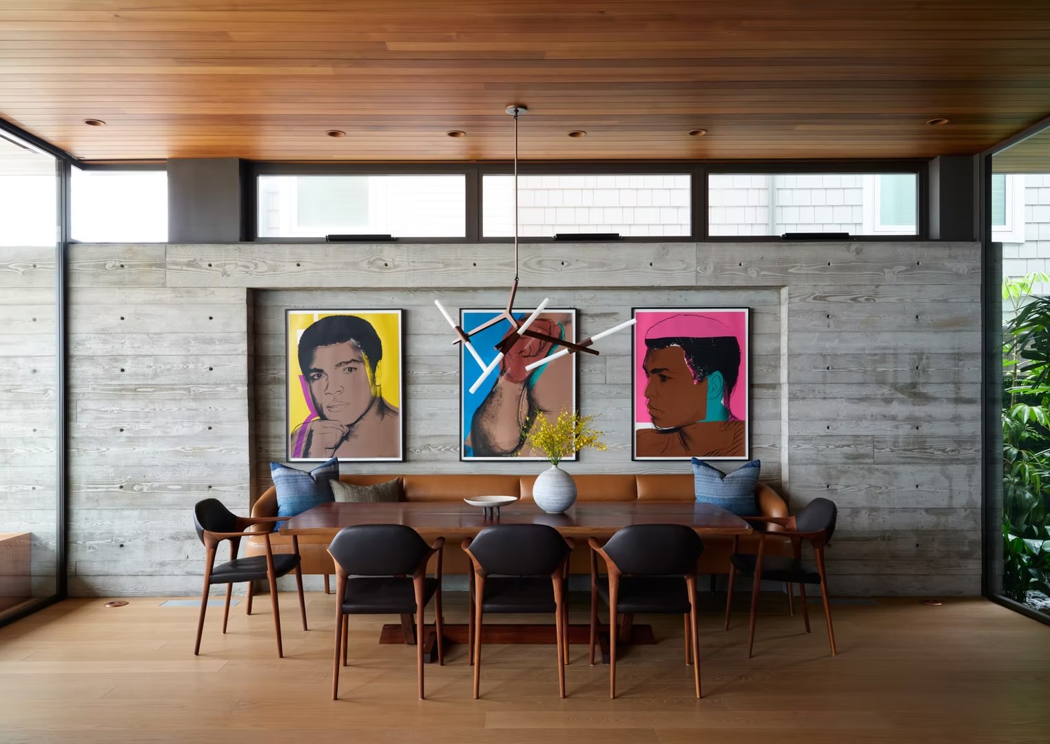 Dining room with board-formed concrete wall